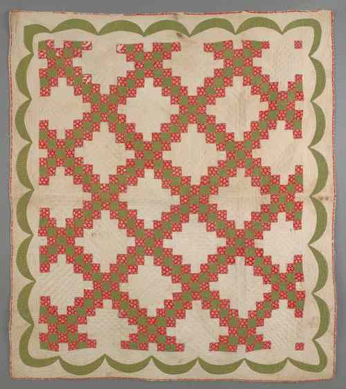 Appraisal: Patch work crib quilt th c with a swag border