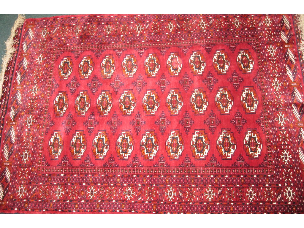 Appraisal: An old Bokhara Rug the central field with three rows