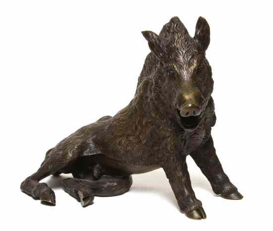 Appraisal: A Continental Animalier Bronze Figure depicting a recumbent boar unsigned