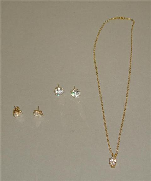 Appraisal: LADY'S EARRING AND PENDANT SUITE Including a pair of marquise