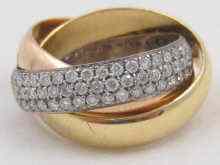 Appraisal: A three colour carat gold ''Russian wedding ring'' by Cartier