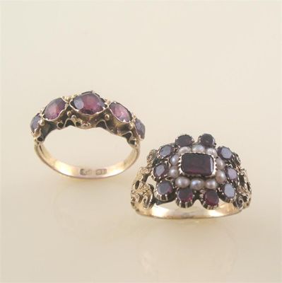 Appraisal: A George III garnet and seed pearl set gold ring