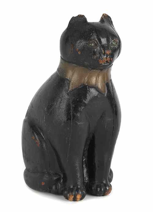 Appraisal: Carved folk art figure of a seated cat ca h