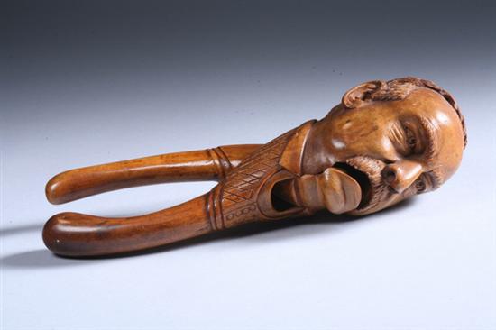 Appraisal: CARVED WOOD NUTCRACKER DEPICTING HEAD OF THEODORE ROOSEVELT early th