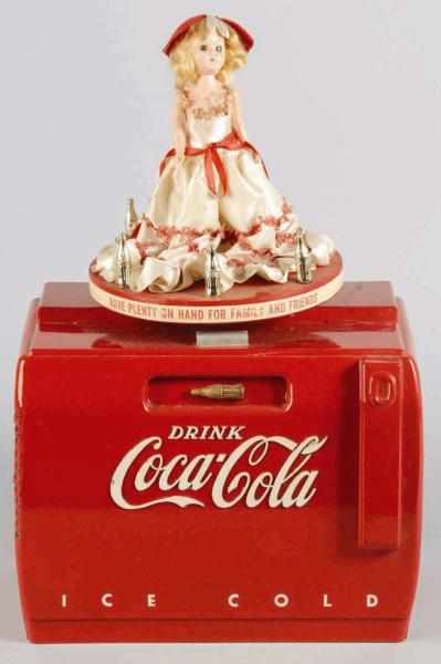 Appraisal: Coca-Cola Cooler Music Box Description s This variation features the