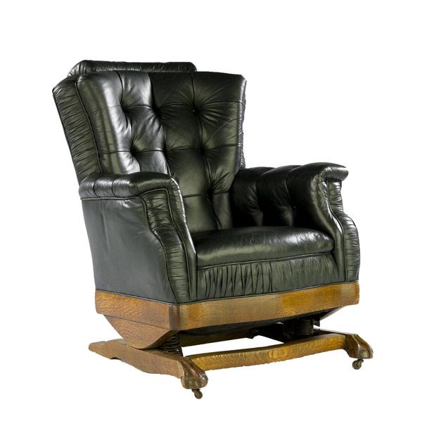 Appraisal: Oak frame platform rocker ca Reupholstered in black leather with