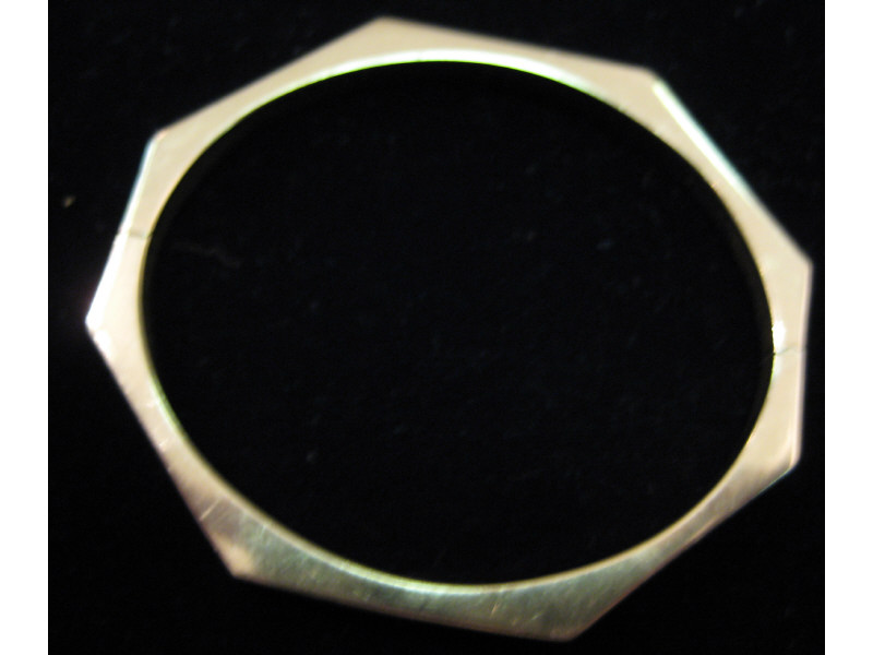 Appraisal: BANGLE BRACELET k yellow gold engraved with octagonal shape Estimate