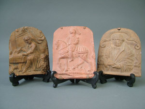 Appraisal: A th century style Continental terracotta plaque moulded with a