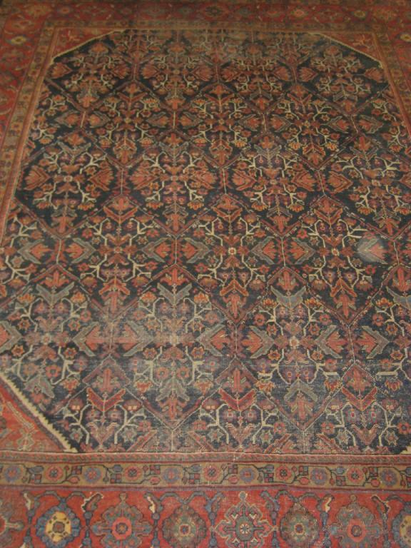 Appraisal: A bordered Mahal Carpet with leafage and rosette design in