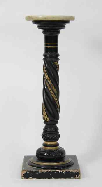 Appraisal: An ebonised and gilt painted pedestal of column form with