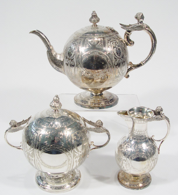 Appraisal: Globular three piece silver plated teaset with figural handles and