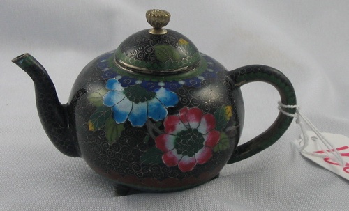 Appraisal: A JAPANESE CLOISONNE MINIATURE TEAPOT having blue and rose flowers