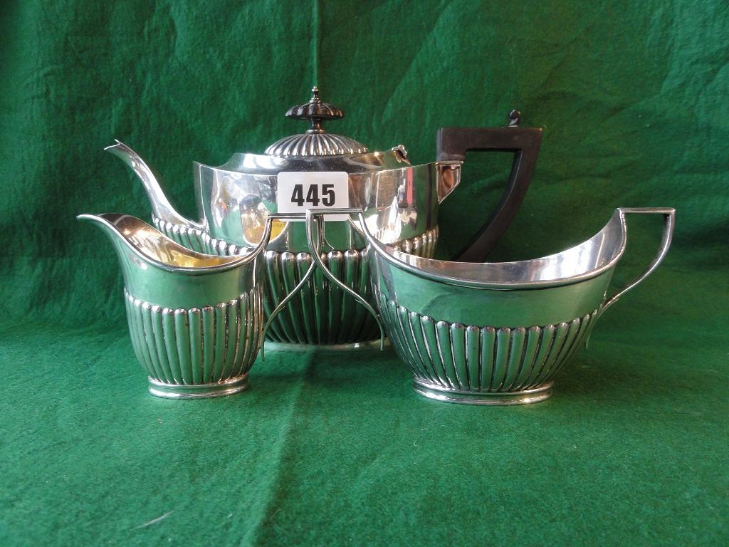 Appraisal: A silver Georgian style three piece half gadrooned tea service