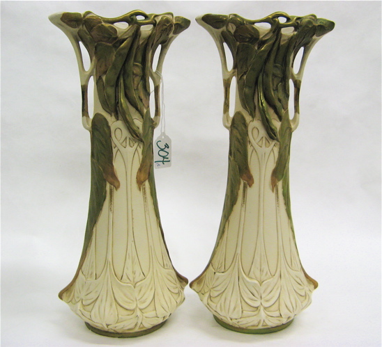 Appraisal: PAIR ROYAL DUX BOHEMIAN POTTERY VASES Art Nouveau style double