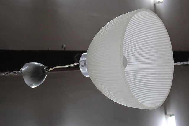 Appraisal: A PAIR OF MODERNIST ALUMINIUM AND FROSTED GLASS PENDENT LIGHT