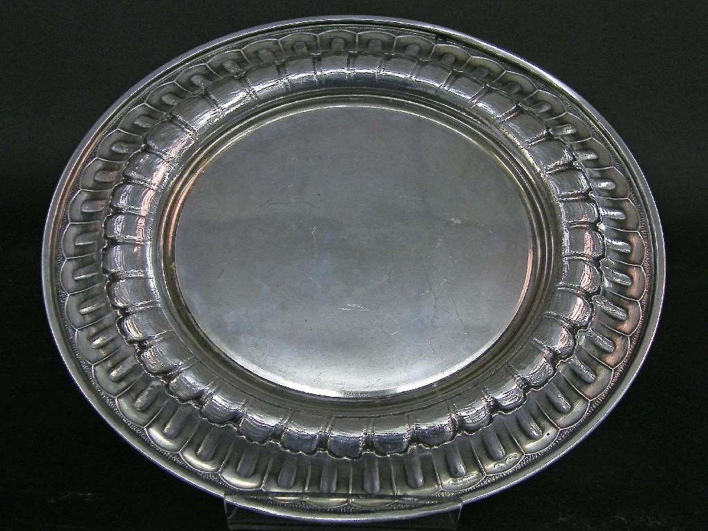 Appraisal: German white metal coaster the raised arched border with repeated