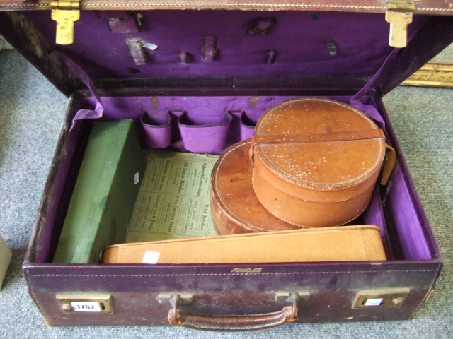 Appraisal: A gentlemans leather dressing case th century with purple silk