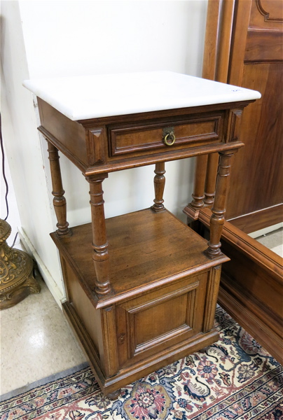 Appraisal: MARBLE-TOP WALNUT NIGHTSTAND German late th century a -tier design