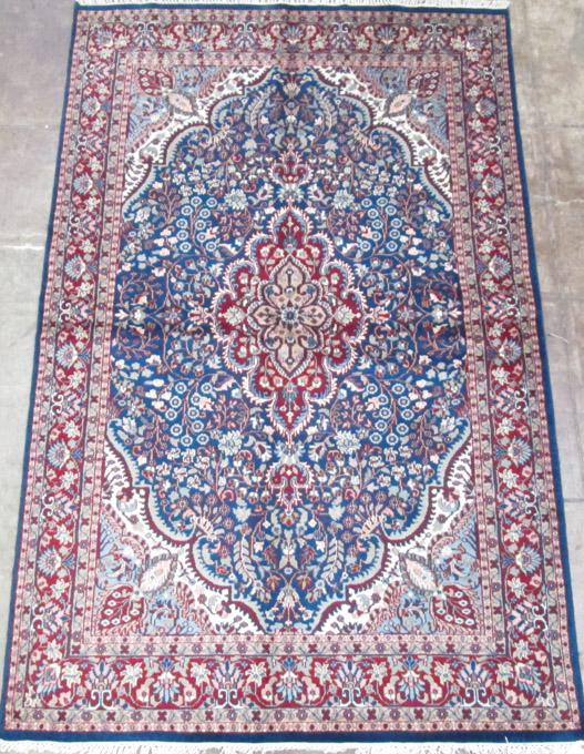 Appraisal: HAND KNOTTED ORIENTAL AREA RUG Indo-Persian floral and central floral