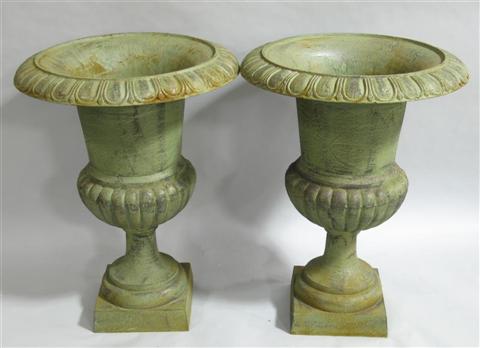 Appraisal: PAIR OF GREEN PATINATED GARDEN URNS Of typical classical form