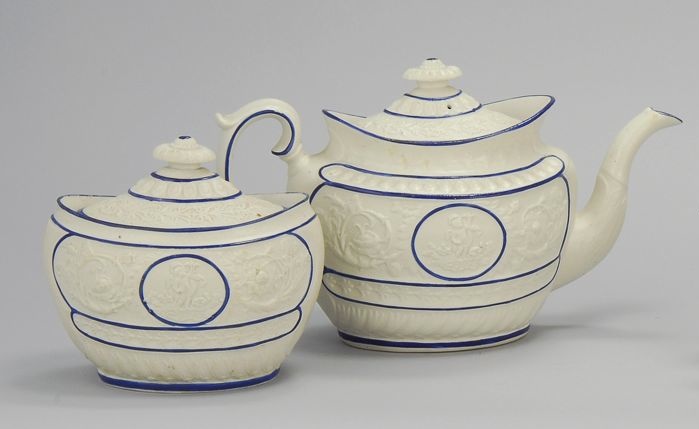 Appraisal: SALT GLAZE TEAPOT AND SUGAR BOWL English First Half of