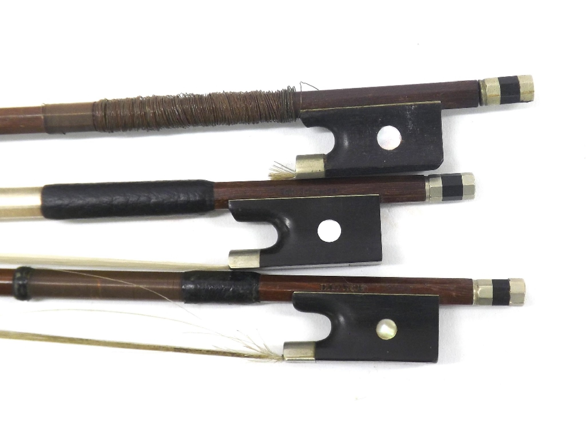 Appraisal: Three nickel mounted violin bows stamped Tourte Bausch and Schneider