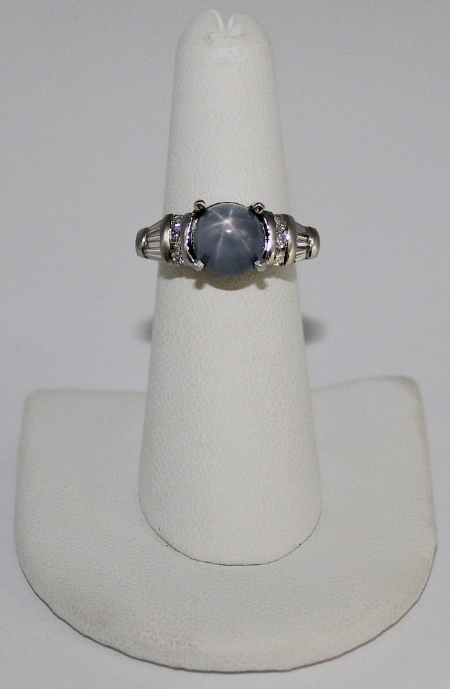 Appraisal: JEWELRY GIA Certified ct Star Sapphire Platinum ring set with