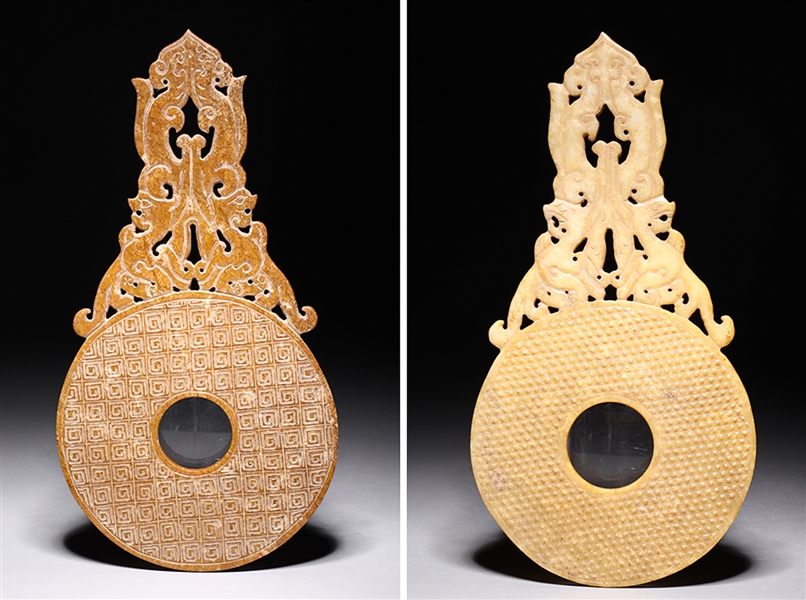 Appraisal: Chinese archaistic hardstone bi with elaborate openwork design overall good