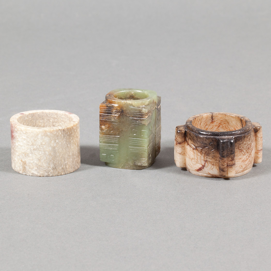 Appraisal: Two Chinese Jade Archer's Rings Together with a Chinese Archaic