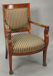 Appraisal: Mahogany upholstered armchair with carved Egyptian Pharaoh arms on claw