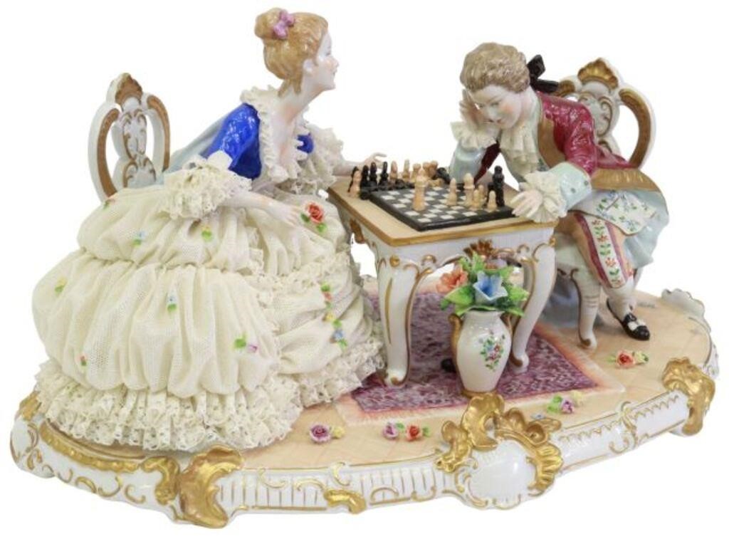 Appraisal: Large German Dresden lace porcelain figural group Checkmate Unterweissbach th