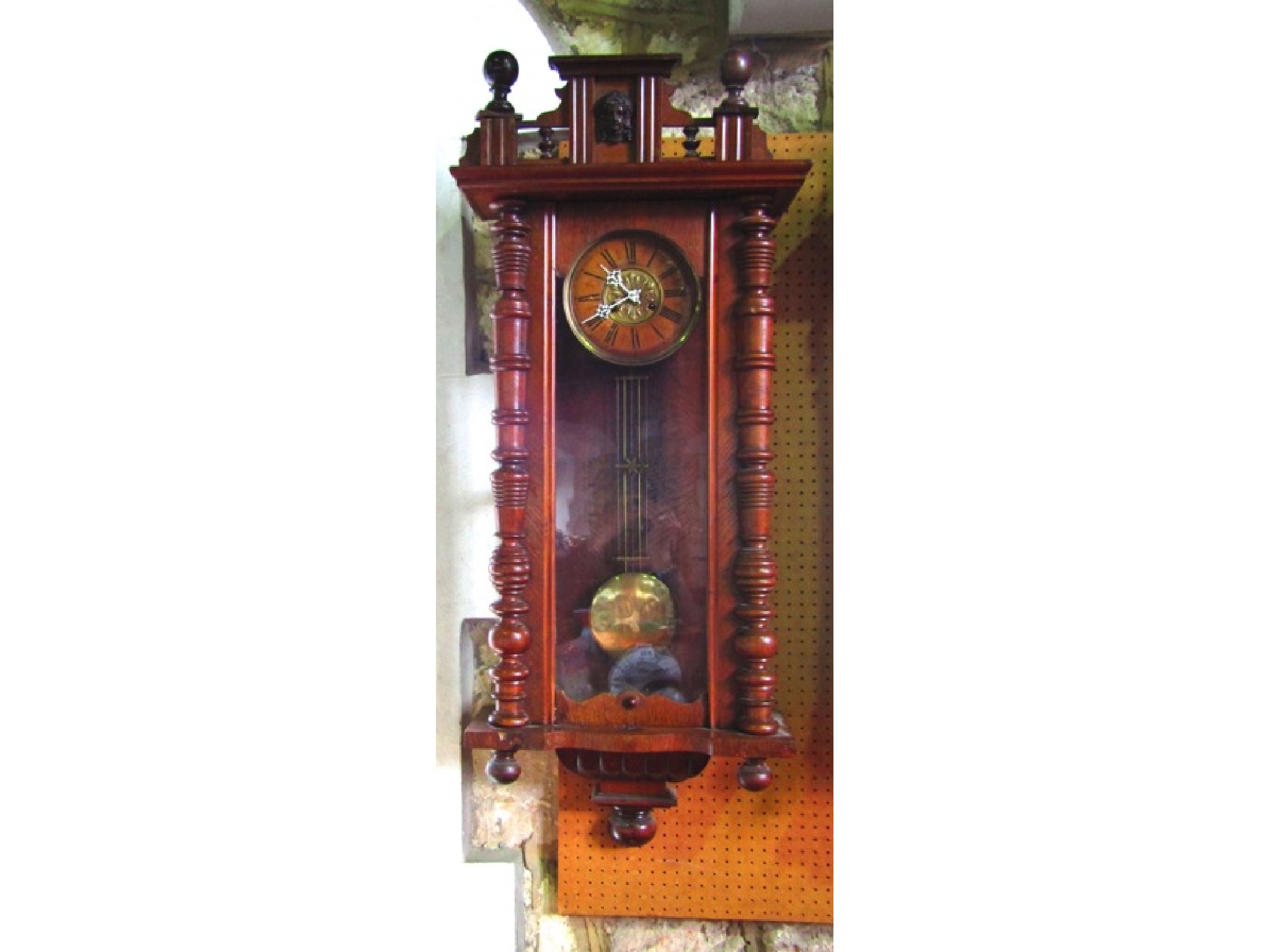 Appraisal: A substantial th century wall clock the walnut case with