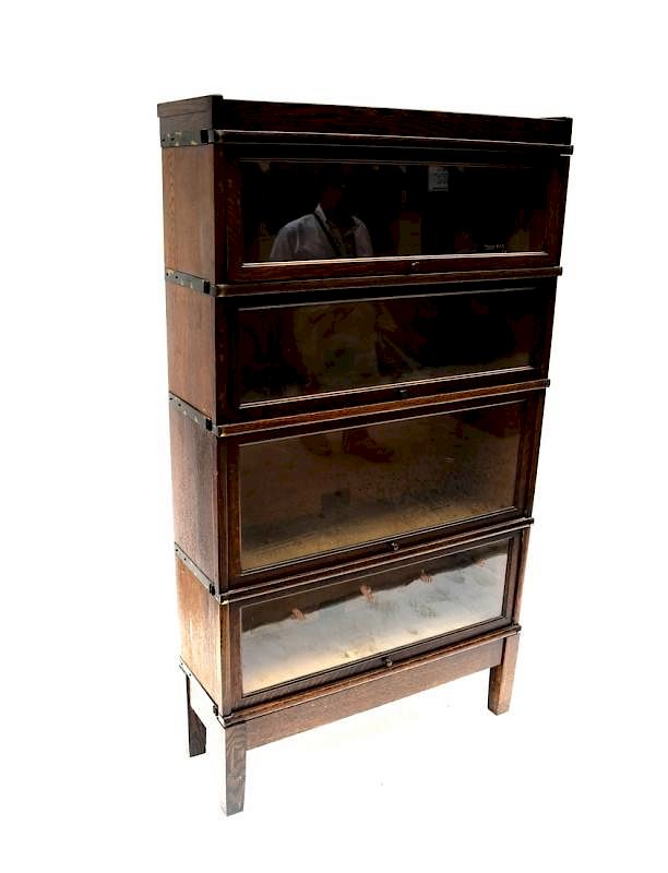 Appraisal: Oak and Glass Tier Book Case Oak and glass Globe