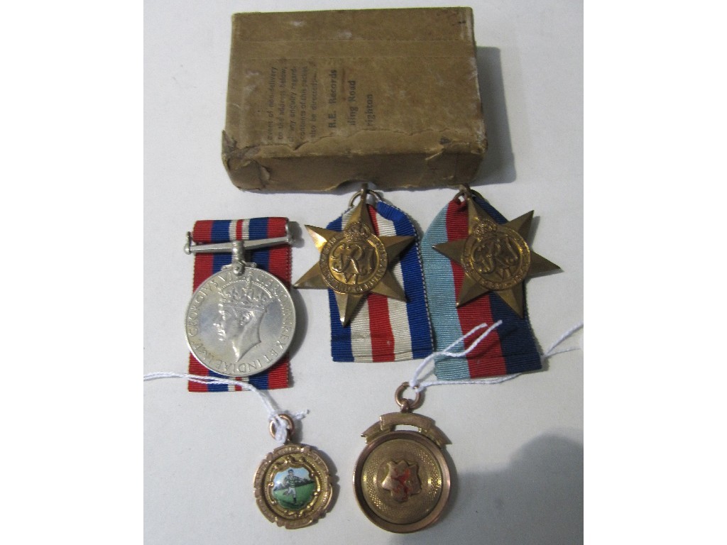 Appraisal: Lot comprising WWII medal group and two ct gold football