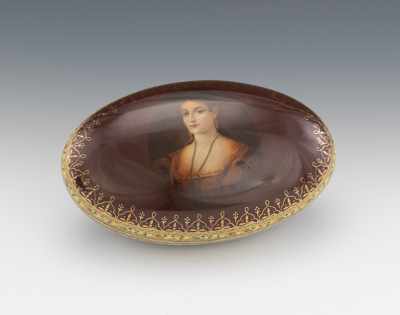 Appraisal: An Oval Porcelain Dresden Style Dresser Box Decorated with the