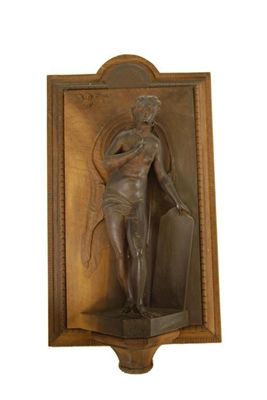 Appraisal: A relief carved wood figure of a naked lady with