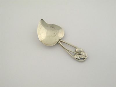 Appraisal: A rare Arts Crafts caddy spoon with a plain leaf-shaped