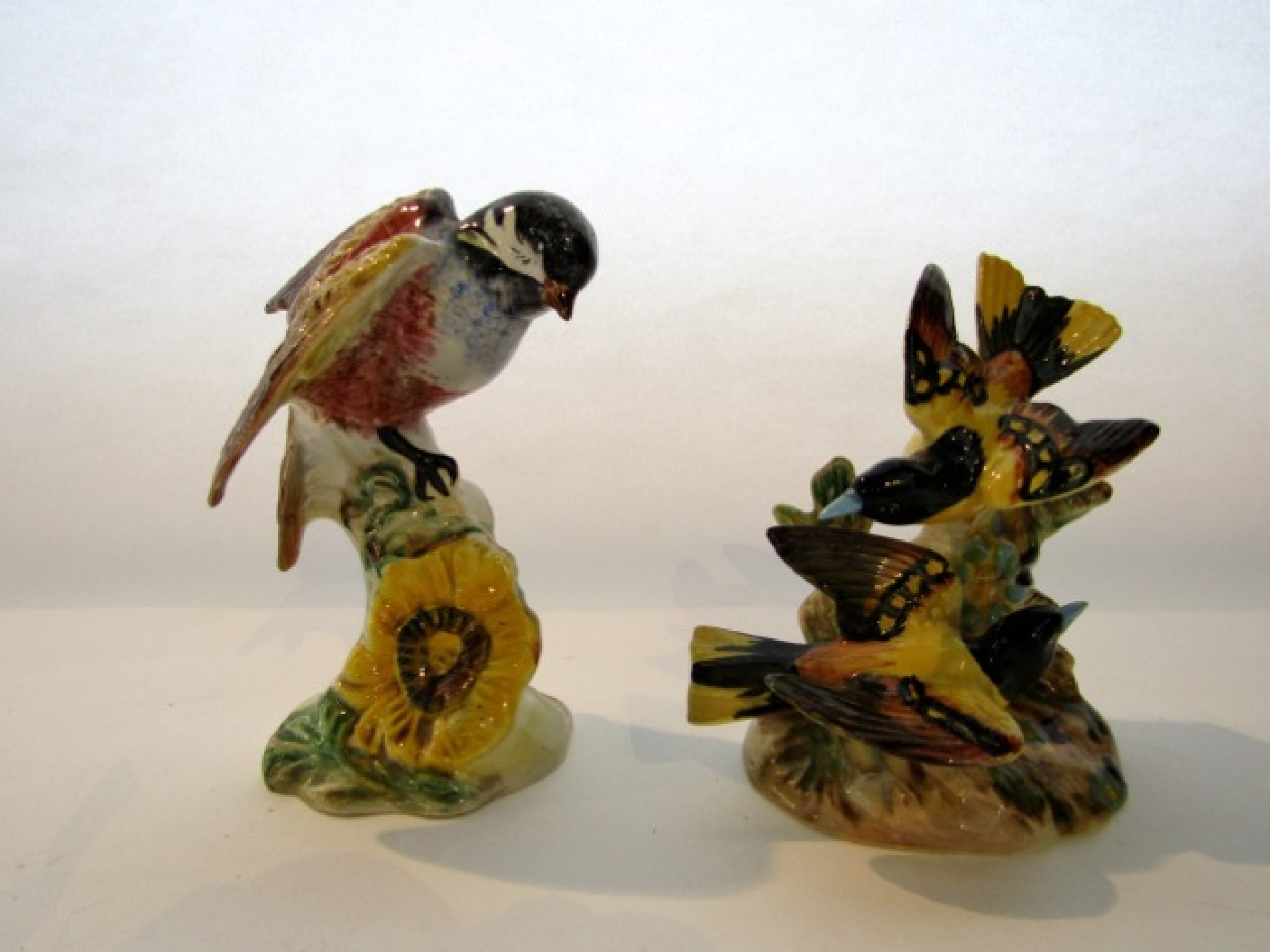 Appraisal: A Beswick model of a Chickadee with impressed number to