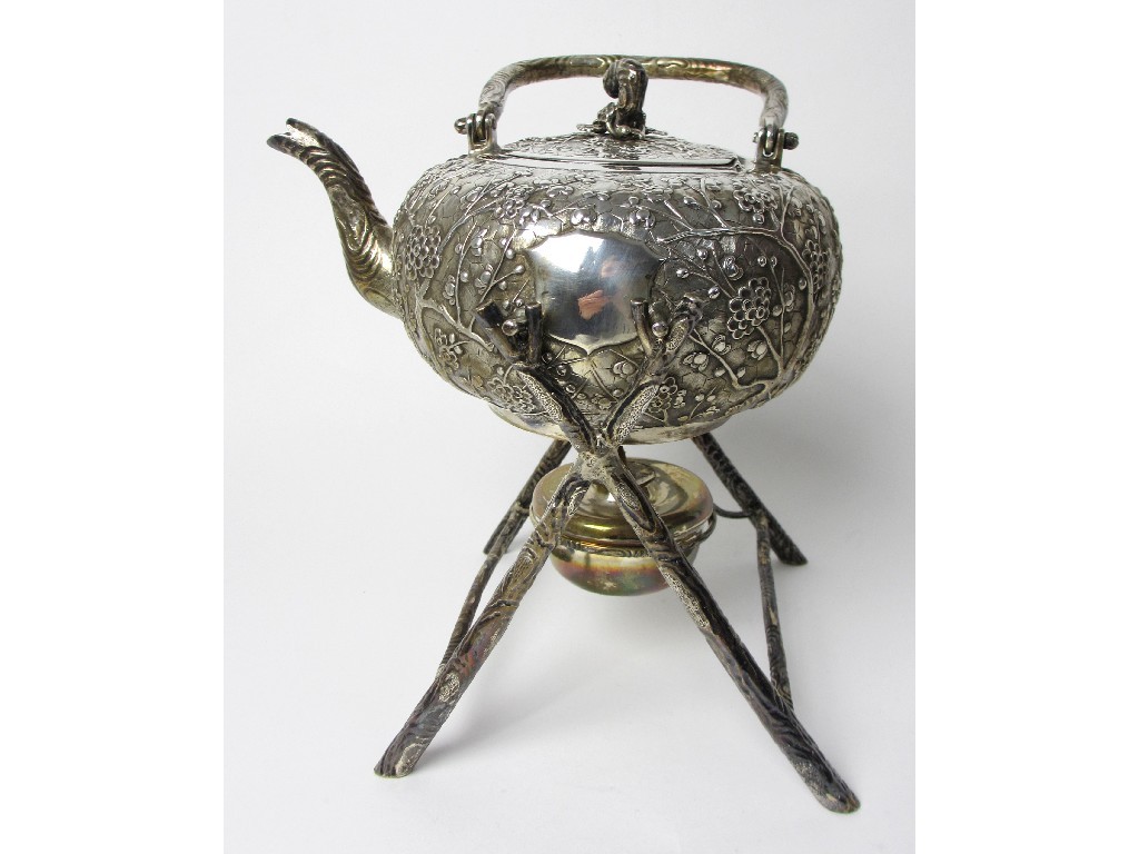 Appraisal: A Chinese white metal tea kettle stand and burner the