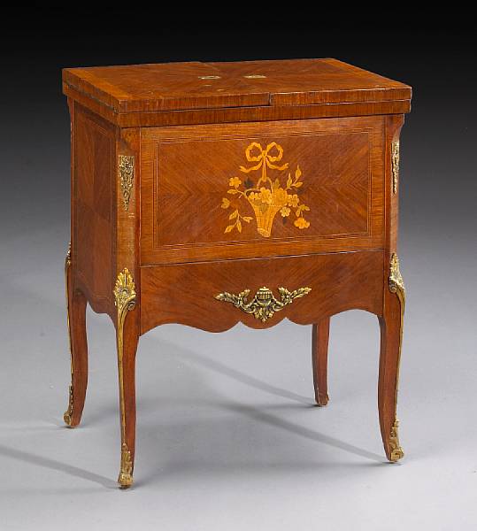 Appraisal: A Louis XV XVI transitional style marquetry cabinet a liqueurs