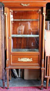 Appraisal: Mahogany vitrine in the Empire taste Mahogany vitrine in the