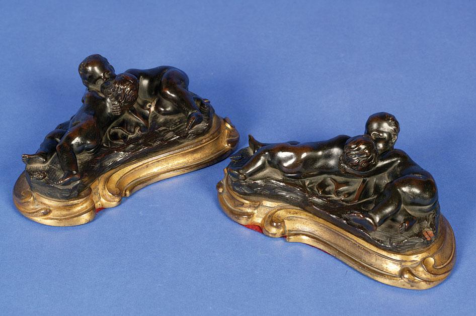 Appraisal: A PAIR OF LOUIS XV STYLE BRONZE GROUPS of embracing