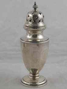 Appraisal: A panelled urn shaped silver sugar caster Z Barraclough Sons