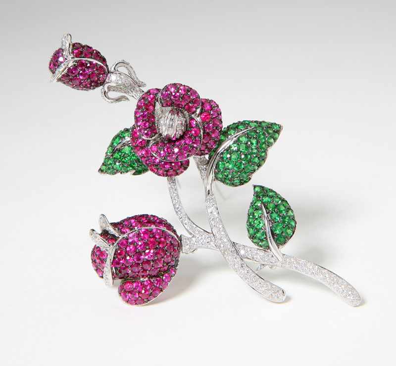 Appraisal: K white and blackened gold flower brooch set with ruby