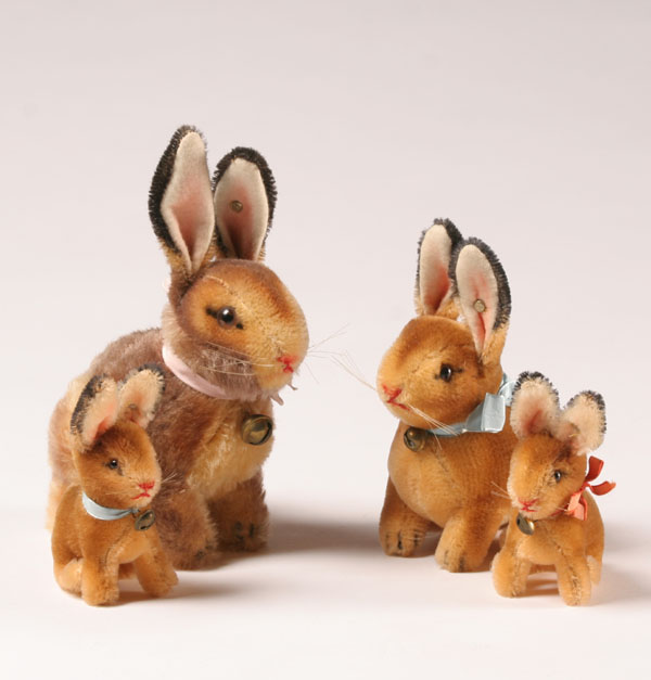 Appraisal: Four Steiff bunnies all with ear buttons and bells two