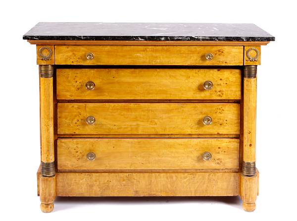 Appraisal: An Empire style bronze mounted marble topped four drawer commode