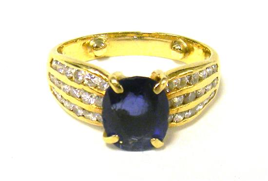 Appraisal: JEWELRY Sapphire and diamond ring oval faceted center sapphire stone