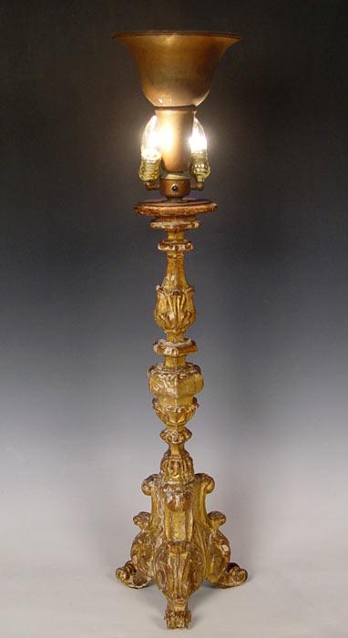 Appraisal: EARLY ITALIAN GILT WOOD ALTAR CANDLE STICK Tall carved gesso