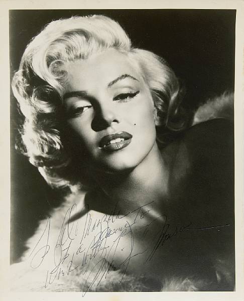 Appraisal: A Marilyn Monroe signed black and white photograph circa One