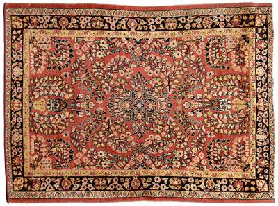 Appraisal: Sarouk rug floral designs on pale salmon field ft in